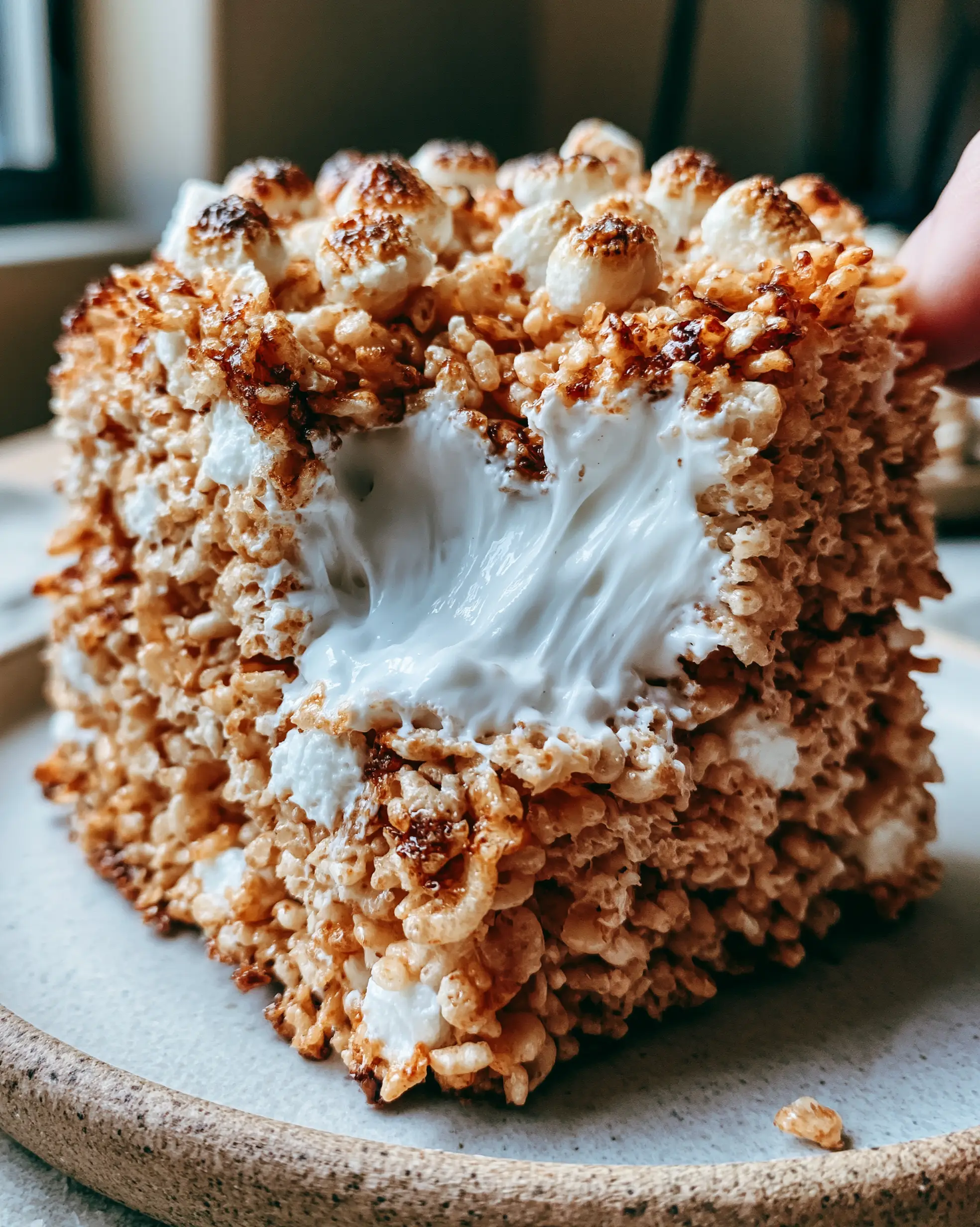 Rice Krispie Treats Recipe: The Ultimate Brown Butter & Gooey Marshmallow Guide 3 Close up photo of a rice krispie treat with dark brown butter specks and golden-brown toasted edges. (rice krispie treats recipe)